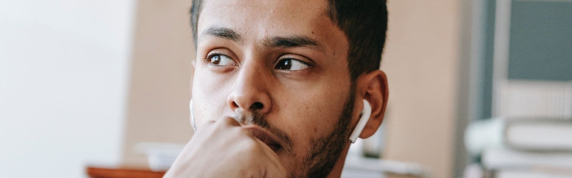 man looking into the distance thoughtfully