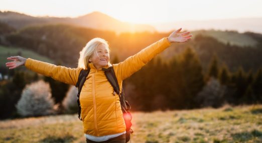 woman hiking on hill