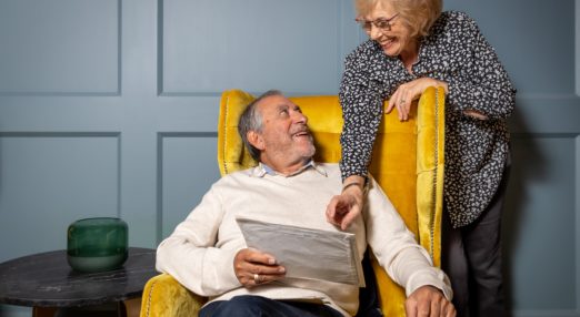 Husband and wife looking at photos