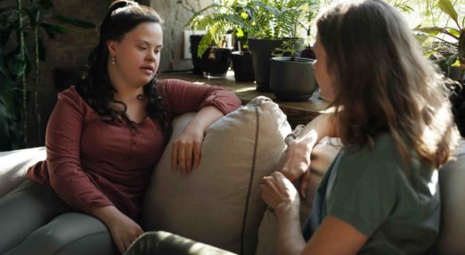 Two women on a sofa