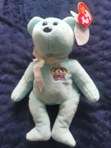 Light blue beanie bear with Royal Crest and Cruse label